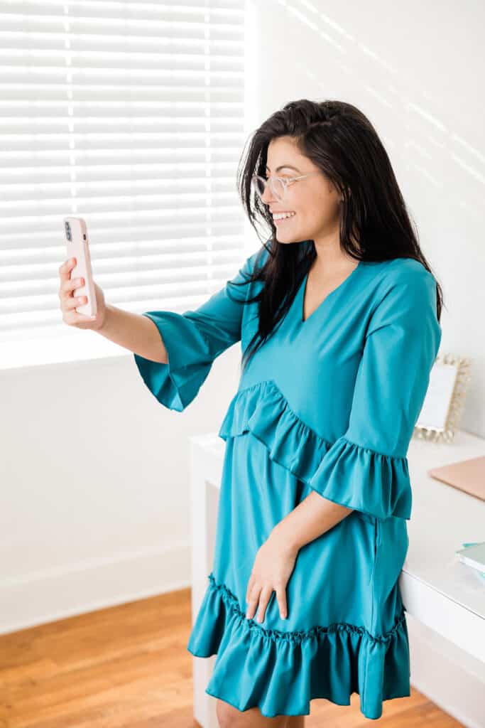 Woman facetiming blogging business contacts