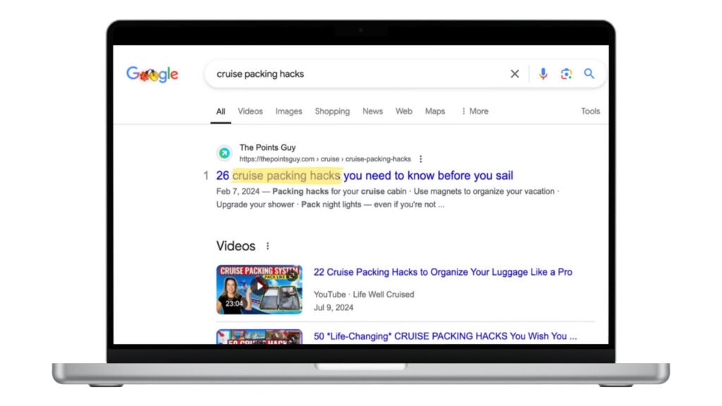 A laptop screen showing a Google search for 'cruise packing hacks' with the first result highlighting the phrase "cruise packing hacks," emphasizing the importance of using targeted keywords in SEO blog post titles for visibility.