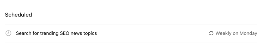 Screenshot of the "All Tasks" page with one task under "Scheduled" showing a reminder to search for trending SEO news topics each Monday. 